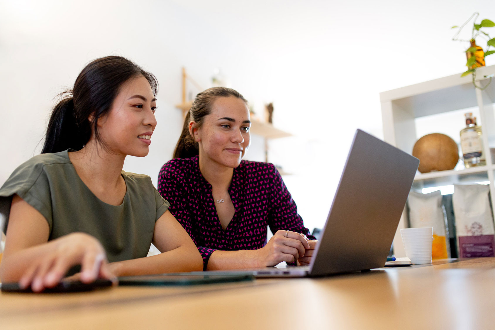 Two young people collaborating on a project