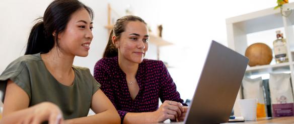 Two young people collaborating on a project